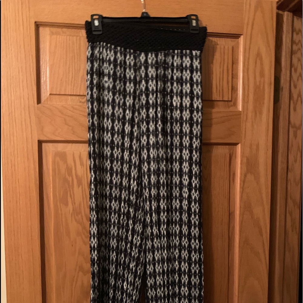 Black and white side leg pants with stretch band.